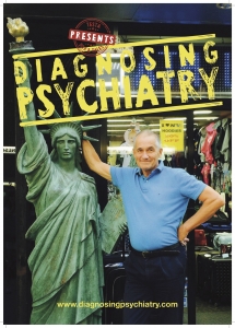 Poster for the documentary Diagnosing Psychiatry. The poster shows Peter C. Gøtzsche in New York standing beside a replica of the Statue of Liberty